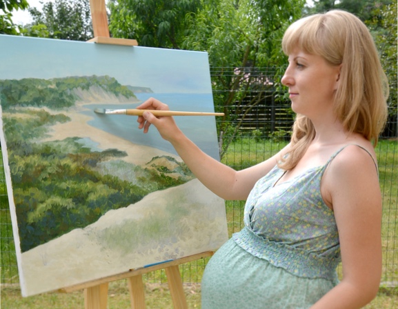 pregnant woman painting